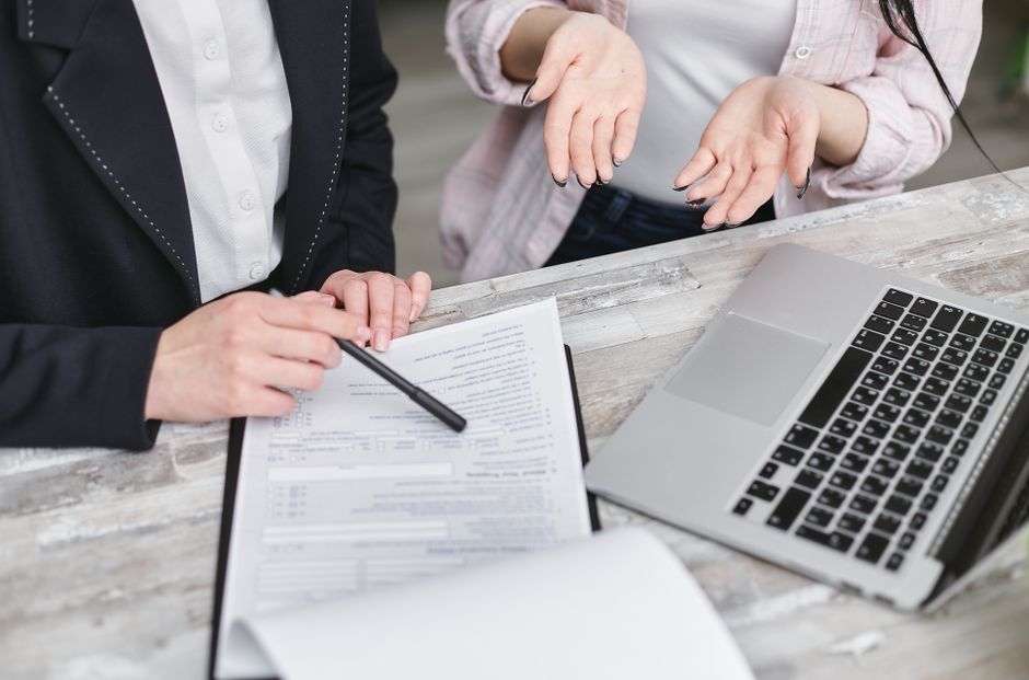 Person reviewing health insurance documents