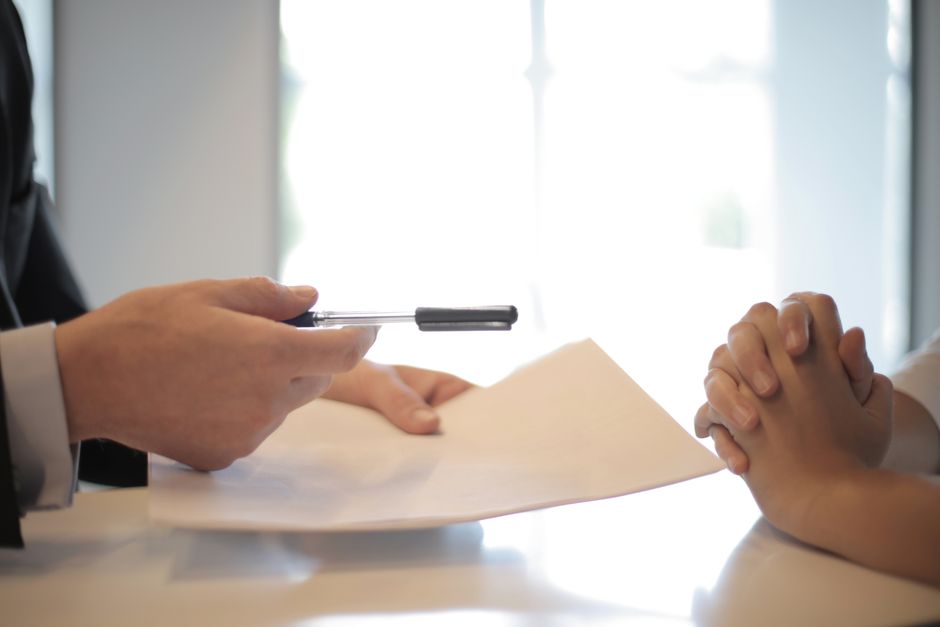 Person reviewing health insurance documents